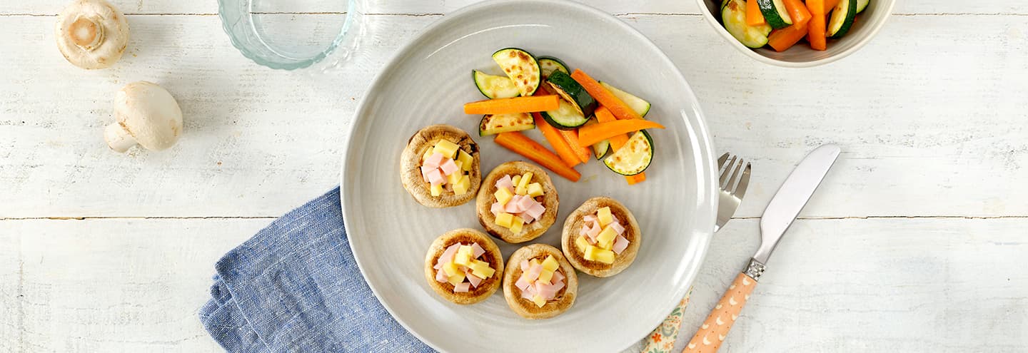 Champiñones rellenos de jamón y queso