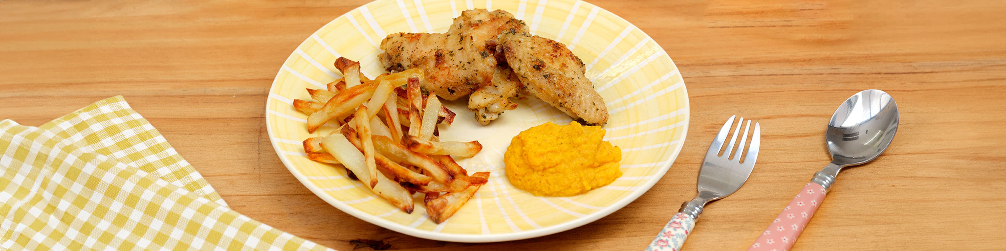 Alitas de pollo con patatas paja