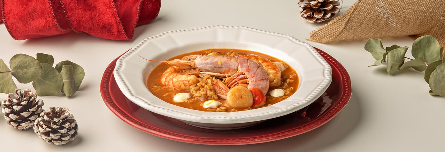 Arroz caldoso de vieiras y gambones