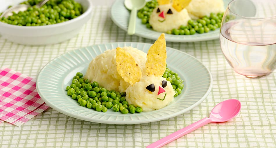 Guisantes salteados con puré de patatas