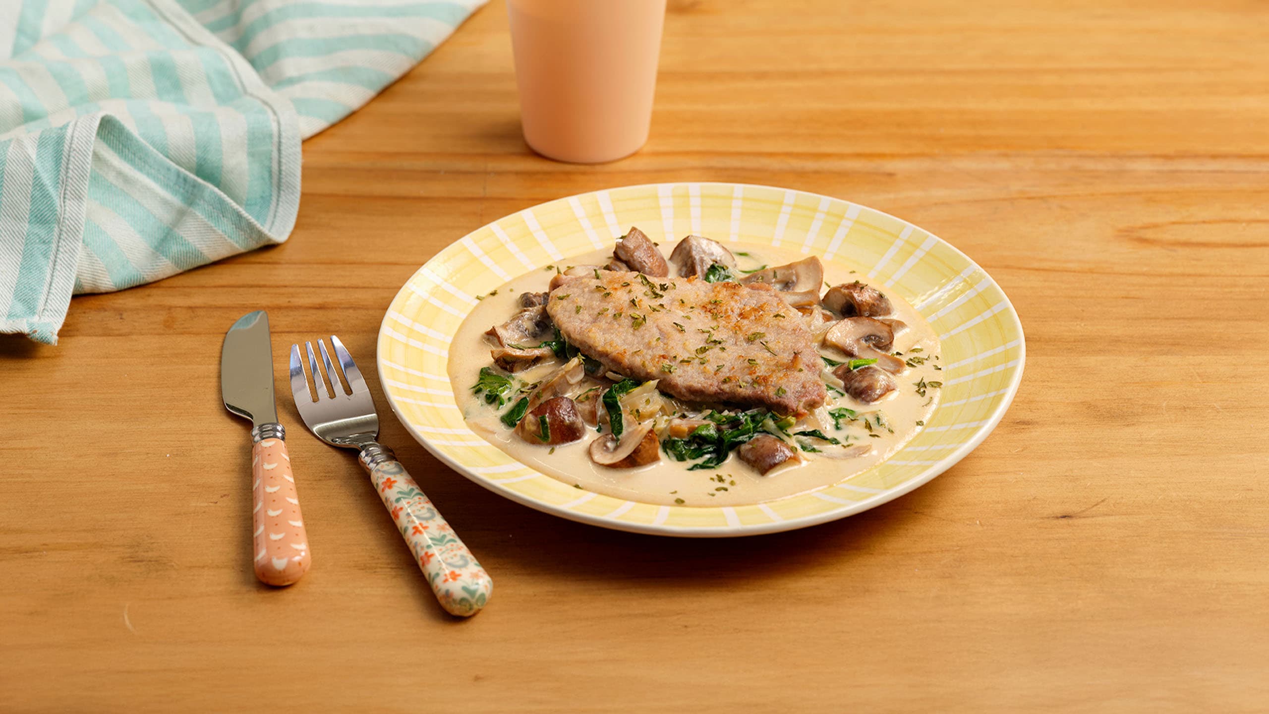 Ternera con salsa de champiñones