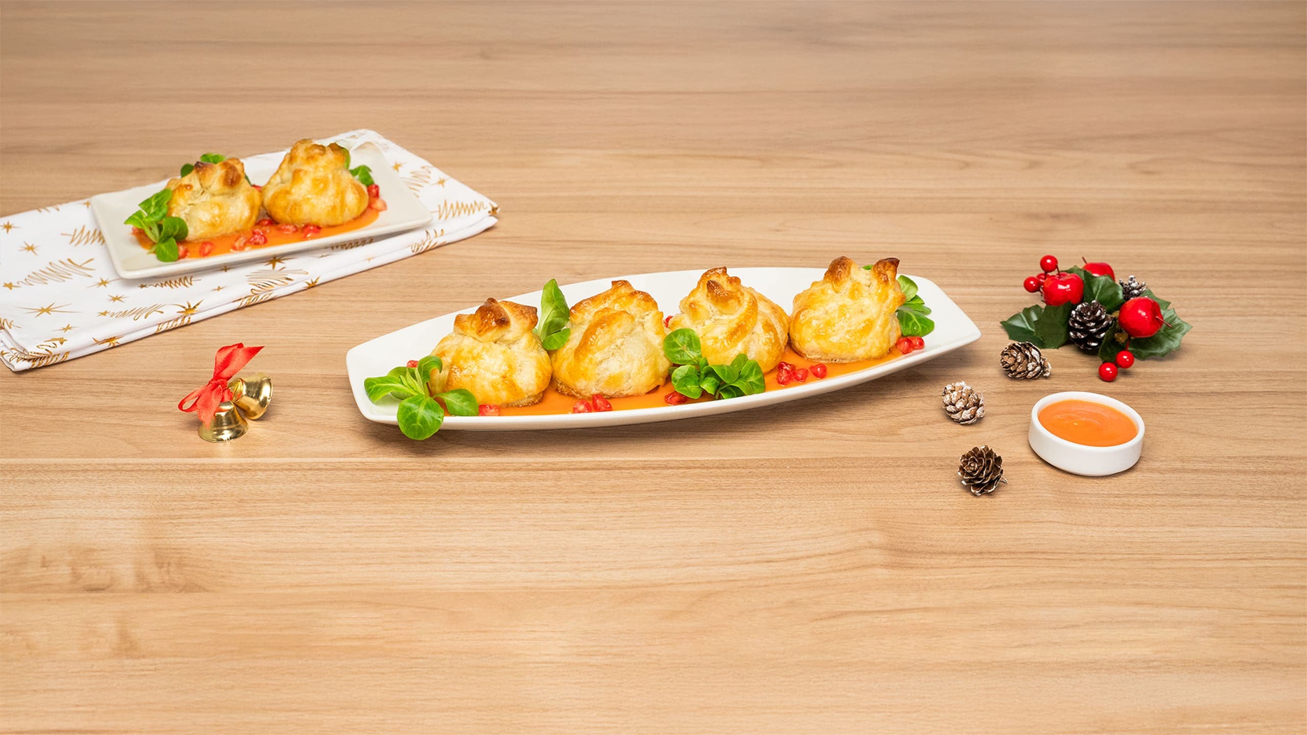 Saquitos de langostinos con salsa de papaya