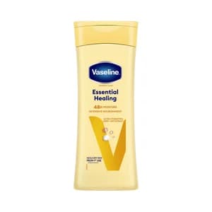 VASELINE Essential healing Loción corporal hidratante con glicerina y extracto de avena, para pieles secas 400 ml.